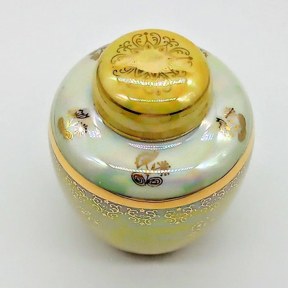 Yellow Iridescent Covered Gold Accented Porcelain Ginger Jar